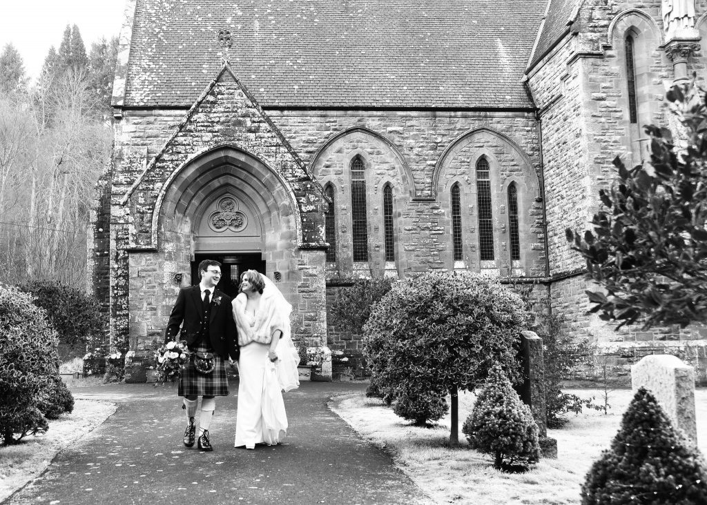 Bride and groom at castle winter wedding