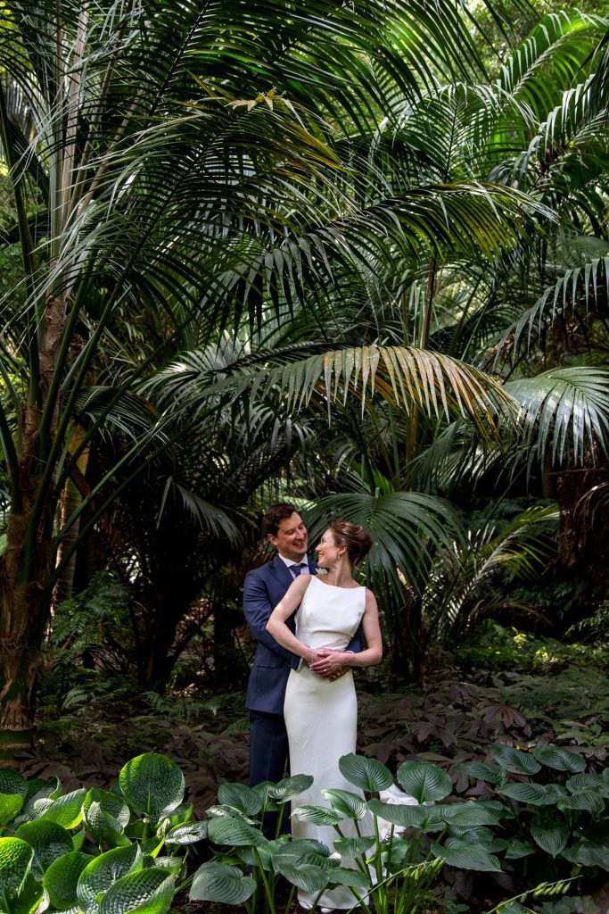 bride and groom in tropical setting