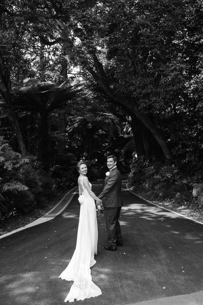 bride and groom with back view