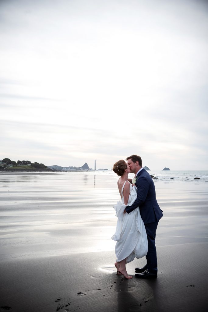 bride and groom on the beach