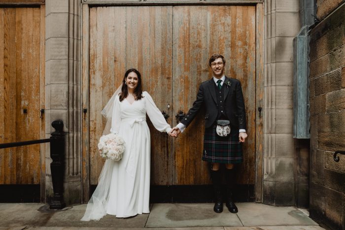 wedding photograph at Edinburgh castle, wrap style georgette dress