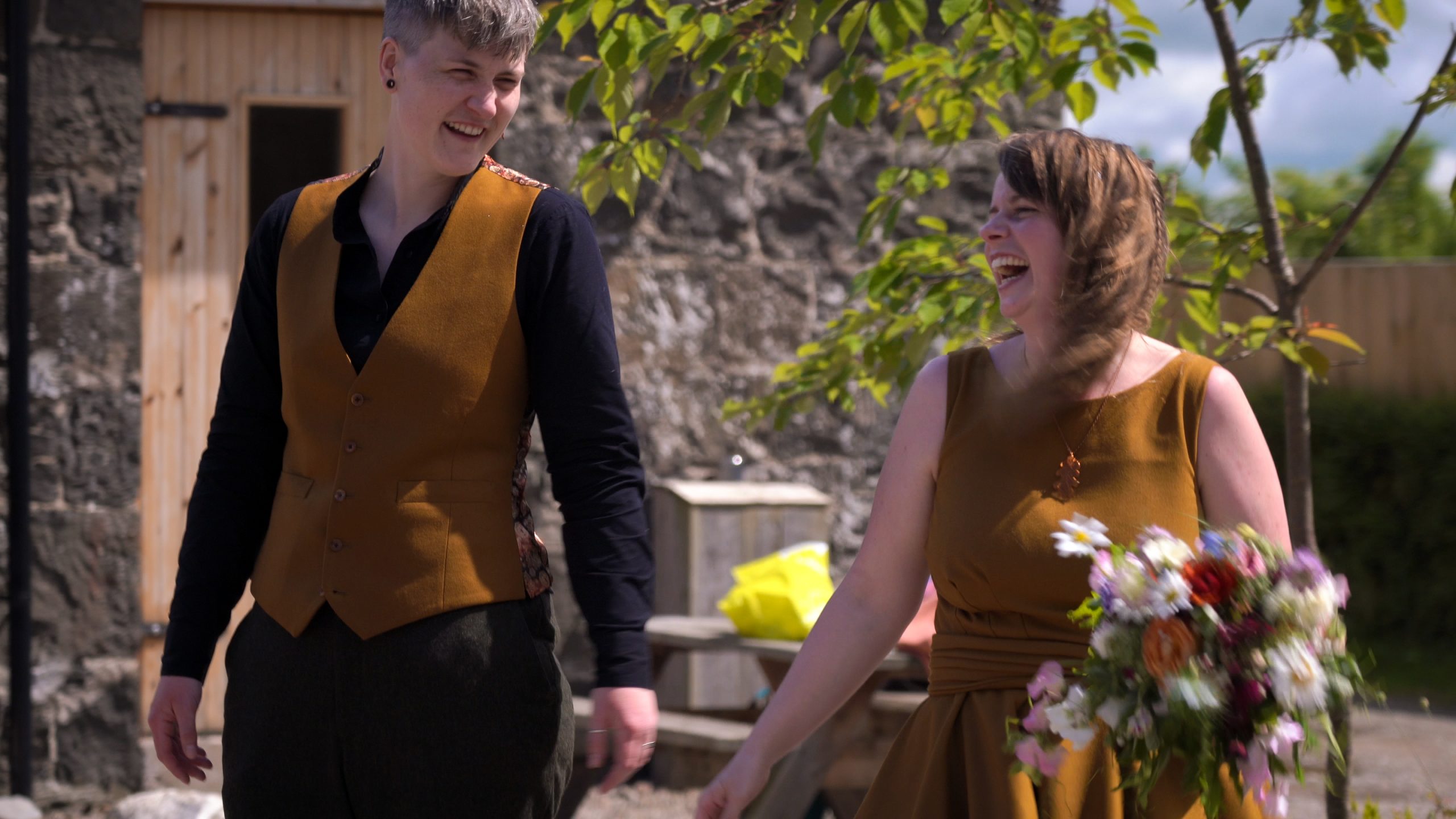 Mustard colour wedding outfits for same sex wedding