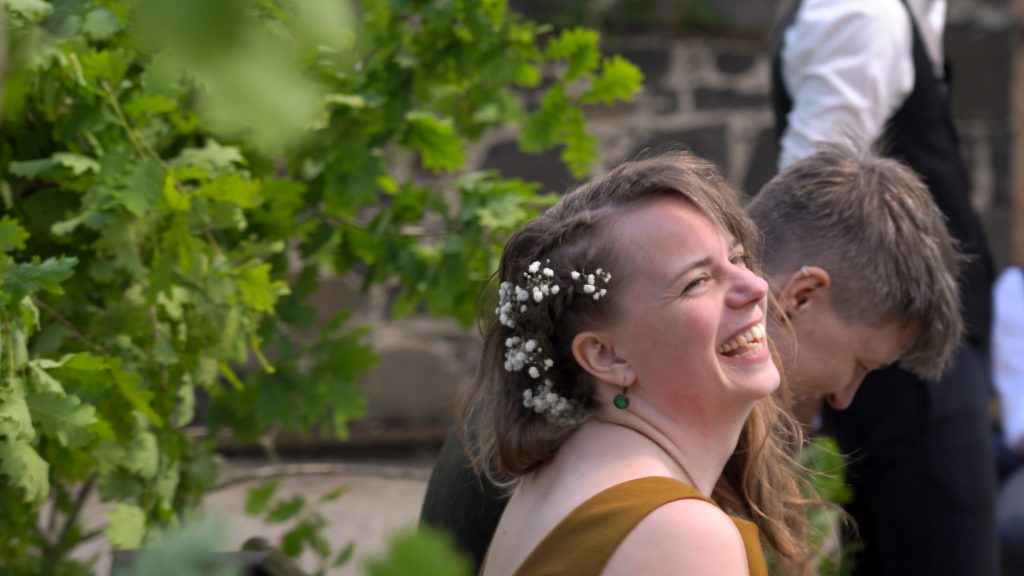 same sex wedding in wool dress