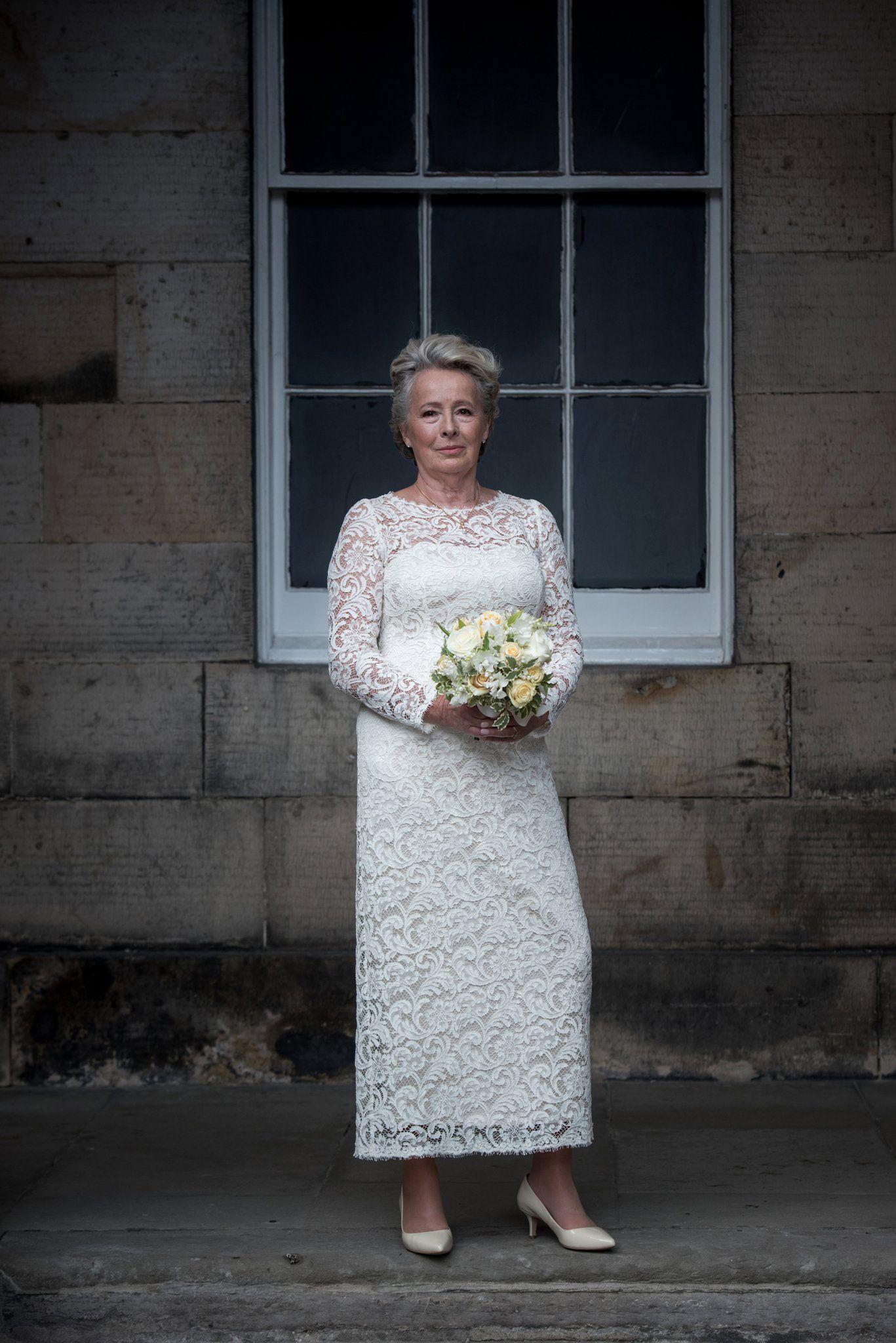 mature bride in silk backed lace wedding dress